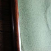 Rectangular mirror tray with wooden handles and gilding.