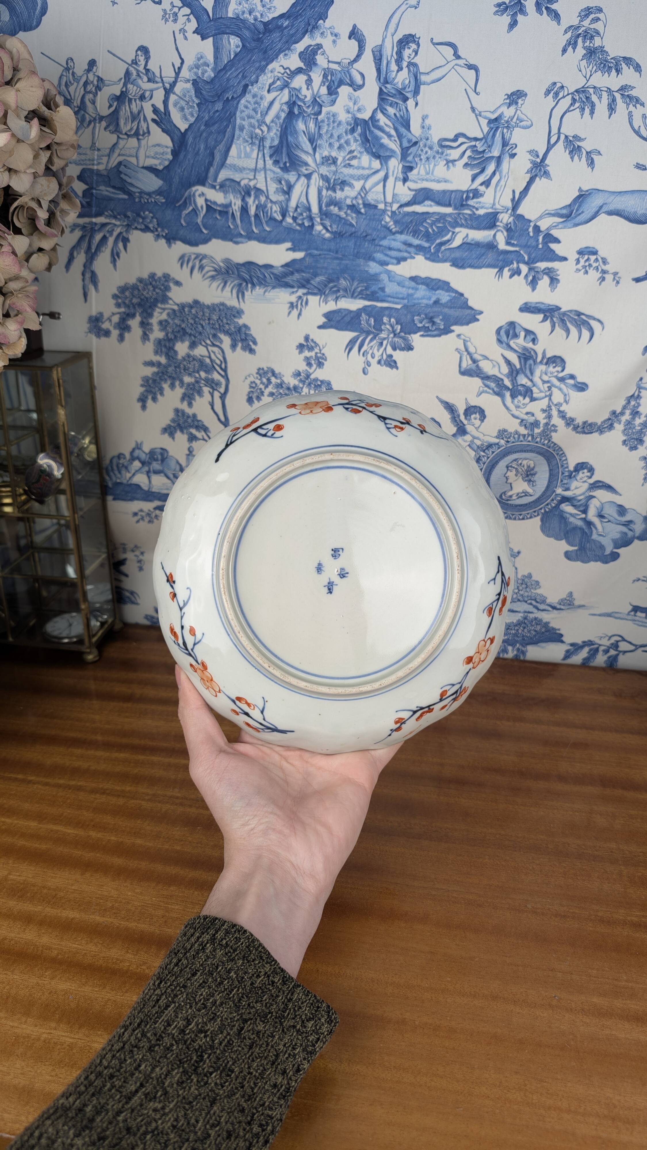 Signed Imari porcelain plate with Japanese lake and deer decoration, 19th century