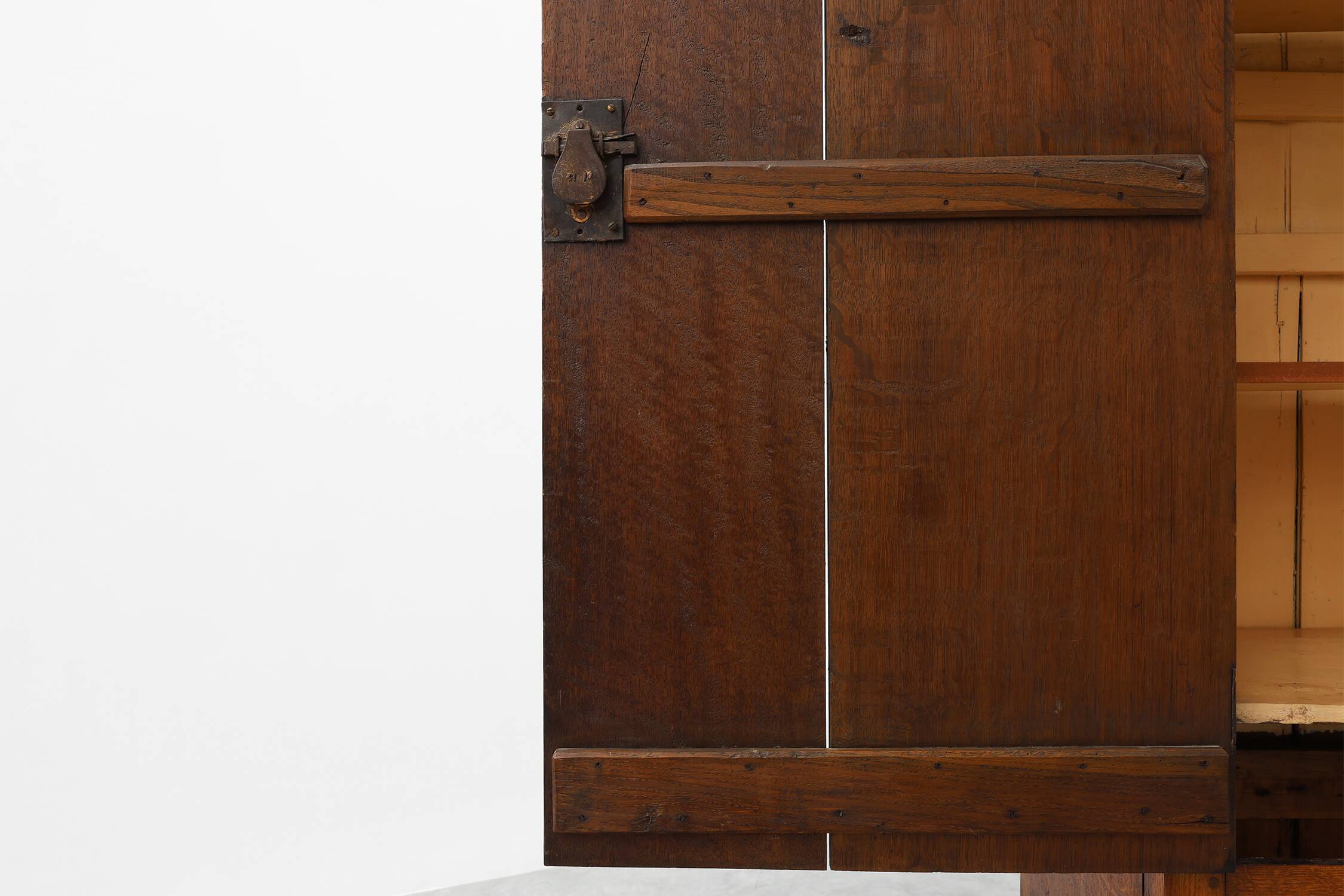 Tall rustic French monastery wardrobe in oak from the late 19th century