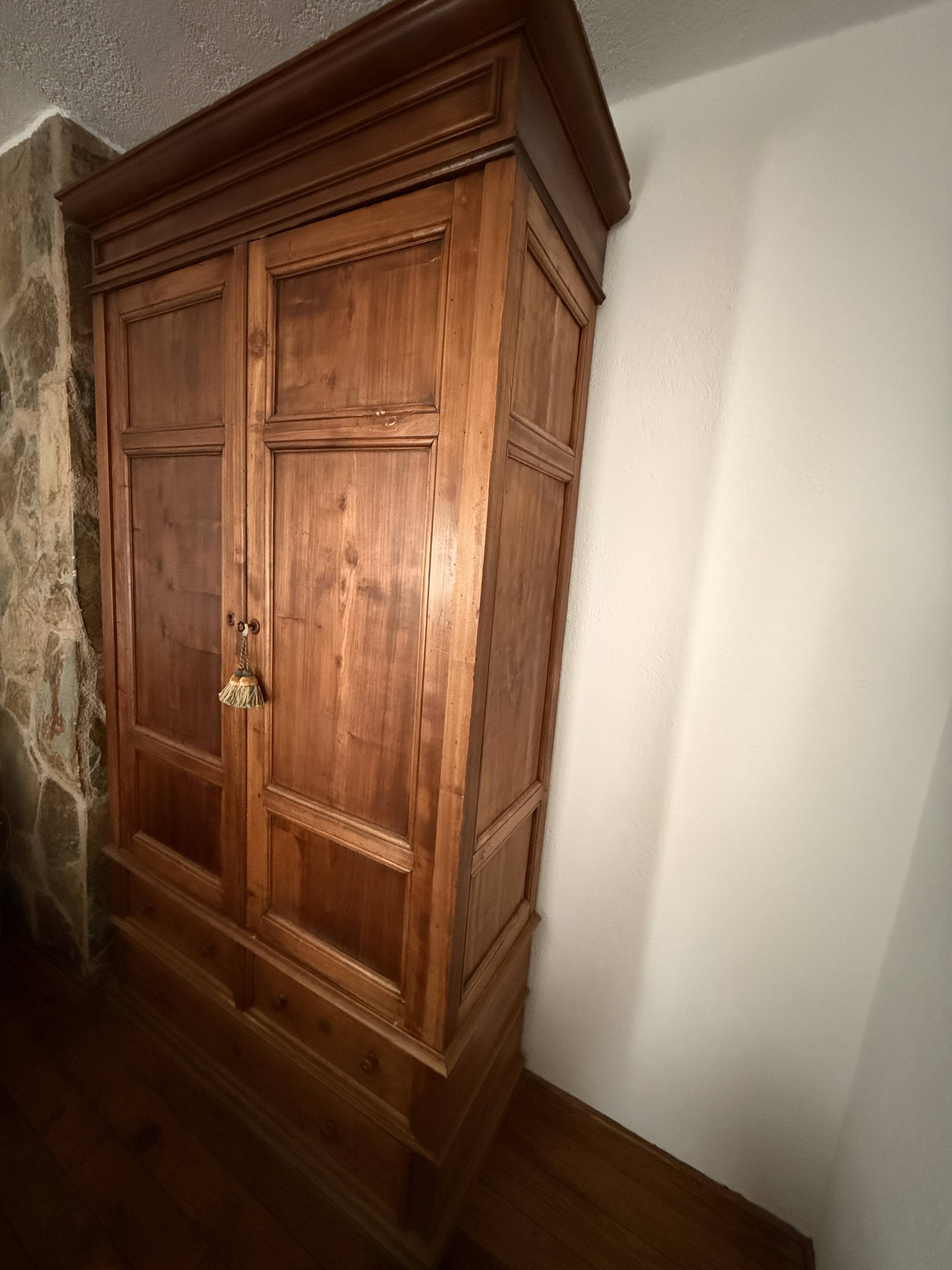 Antique solid wood wardrobe, rustic, with drawers and original key.