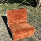 Chrome steel armchair and orange fabric by Vittorio Introini