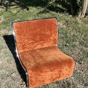 Chrome steel armchair and orange fabric by Vittorio Introini