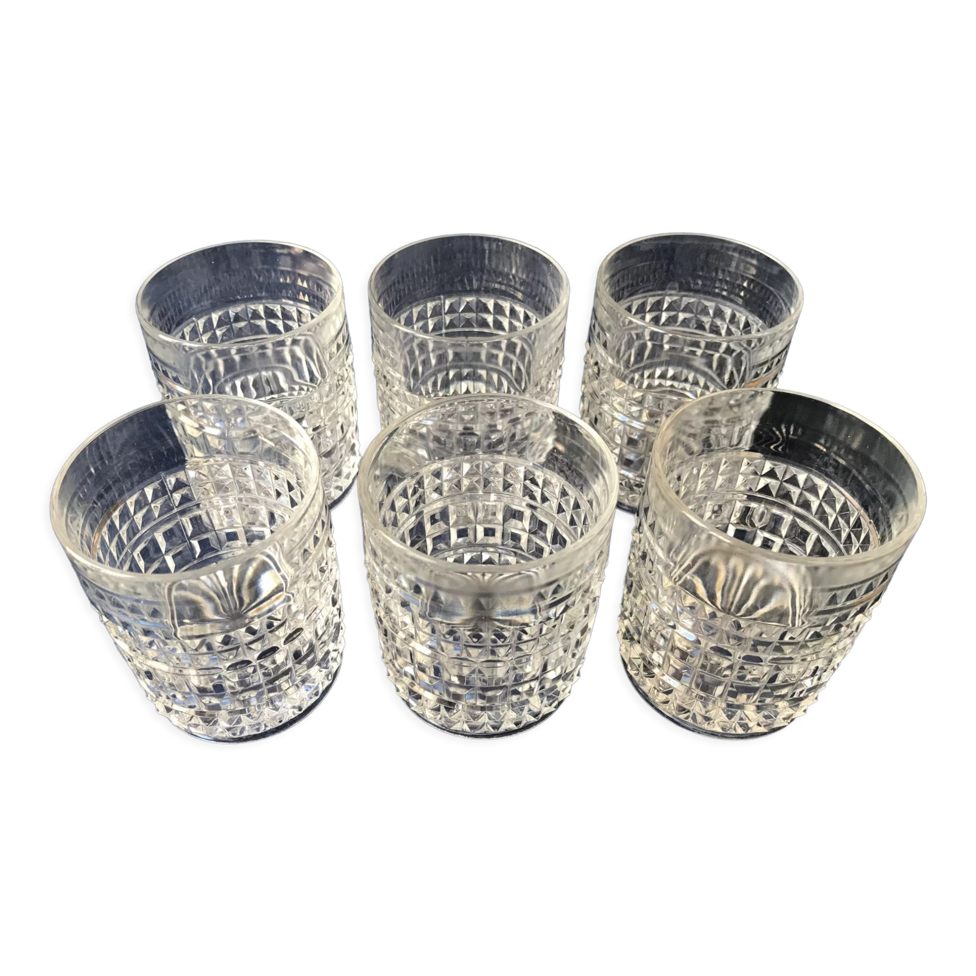 Six diamond-tipped cut glass cups