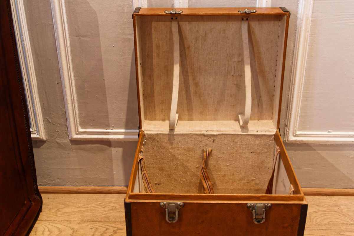 Leather and brass hat malle