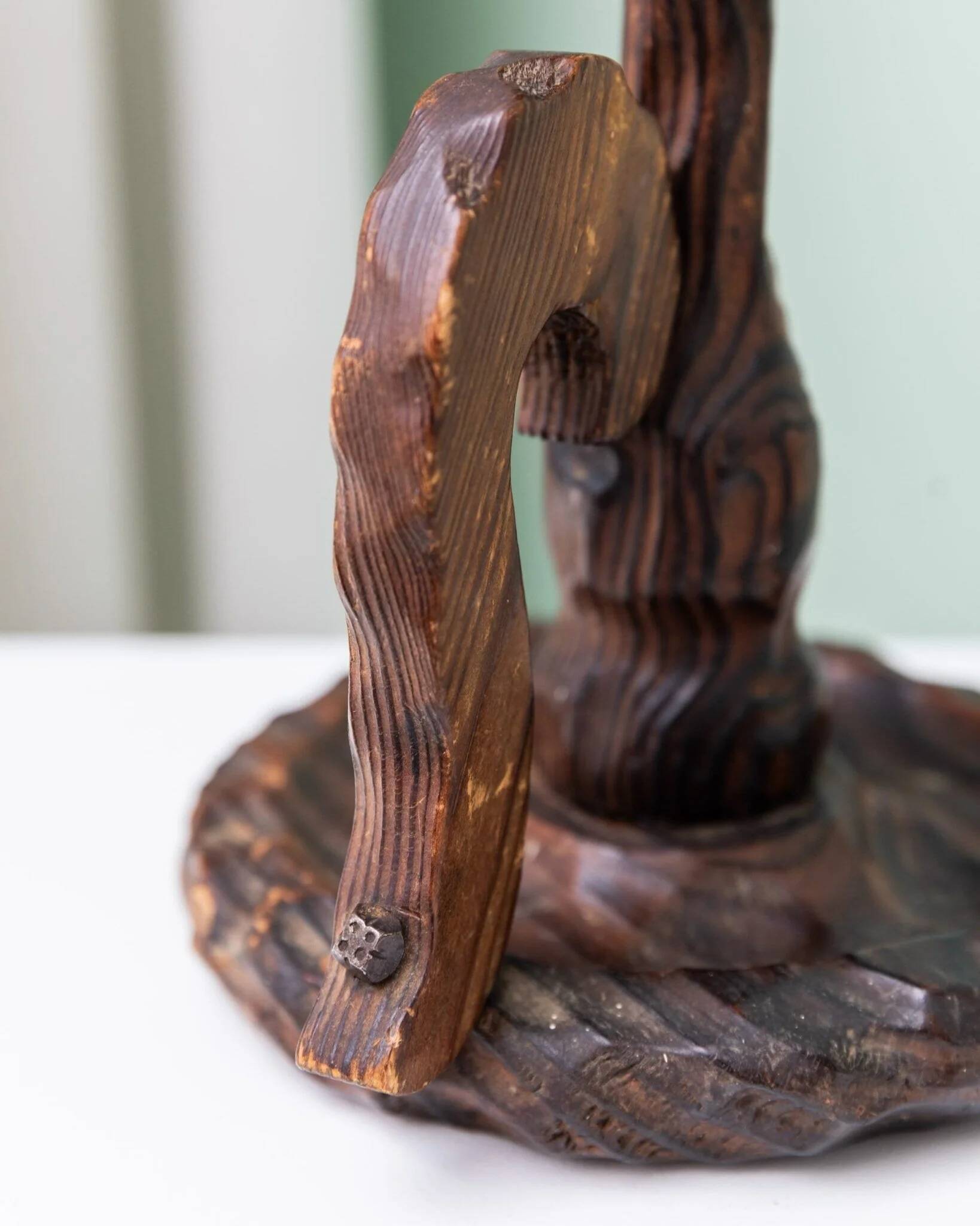 Brutalist carved wood candle holder, dark brown with lighter highlights, made in Italy, 1940s