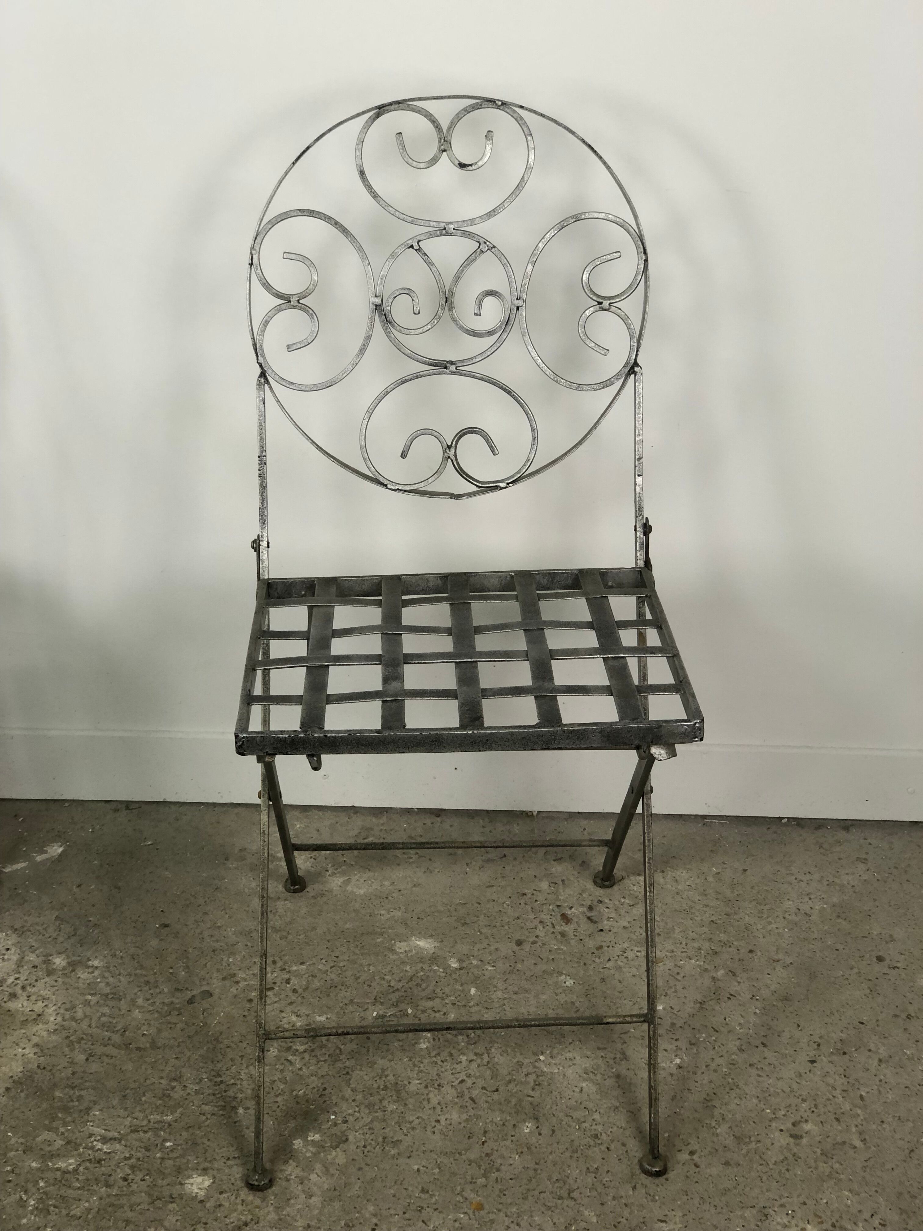 Garden chairs and armchairs (series of 4) vintage 1980 in wrought iron