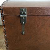 Ancient wooden and faux leather trunk