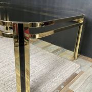 Vintage 1970s coffee table in gold metal and smoked glass.