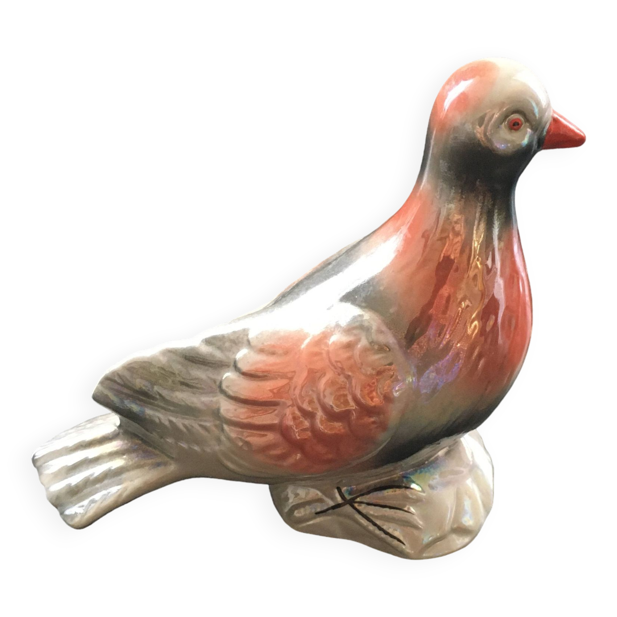 Antique bird in pearly ceramic