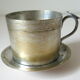 Individual silver metal coffee maker