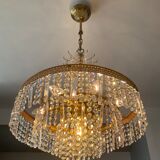 Old brass chandelier and crystal grapevines