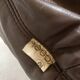 Ligne Roset Marsala - fauteuil and ottman - brown leather