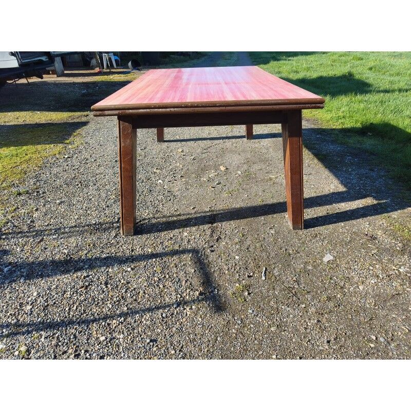 1960s oak dining table with integrated extensions.