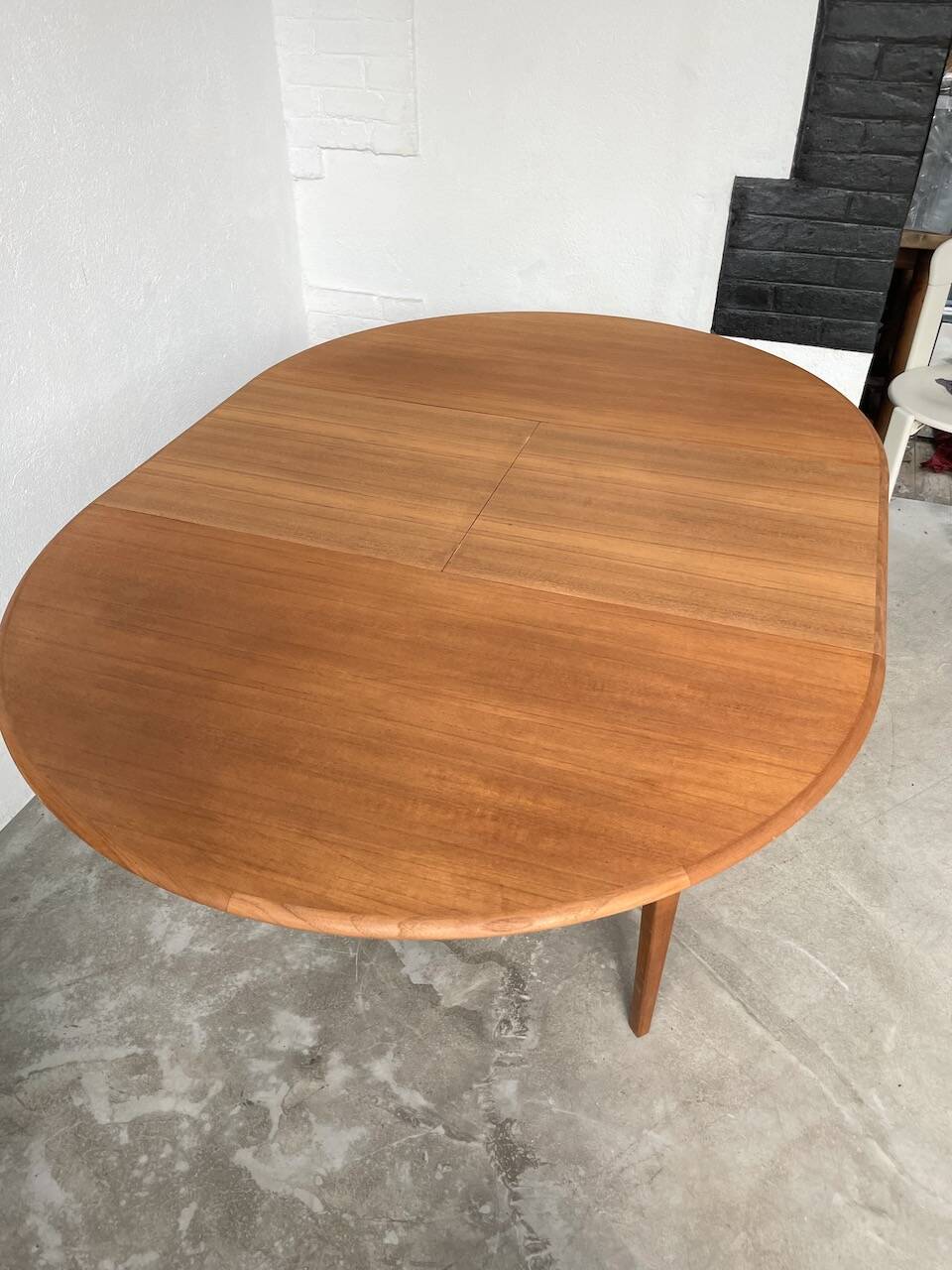Scandinavian round teak table with extension