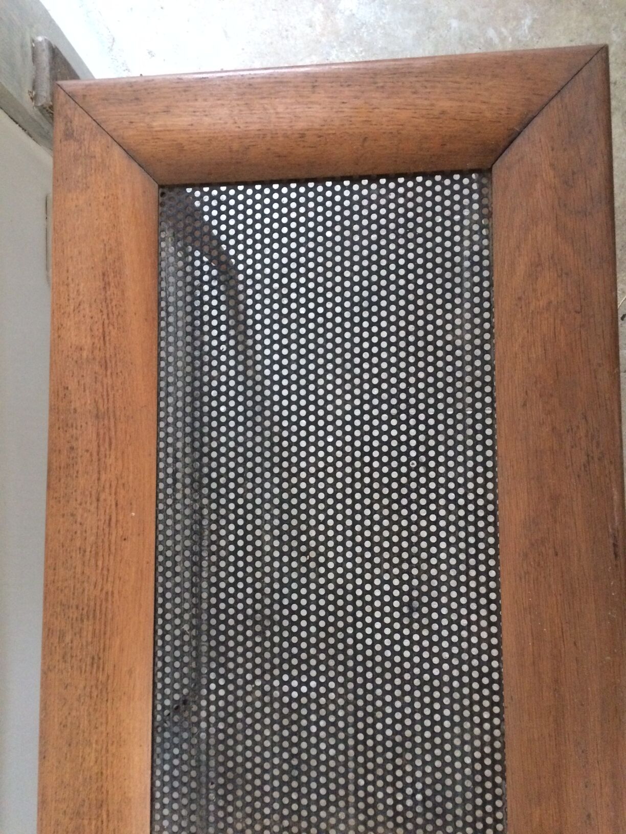 Wood and perforated metal coffee table