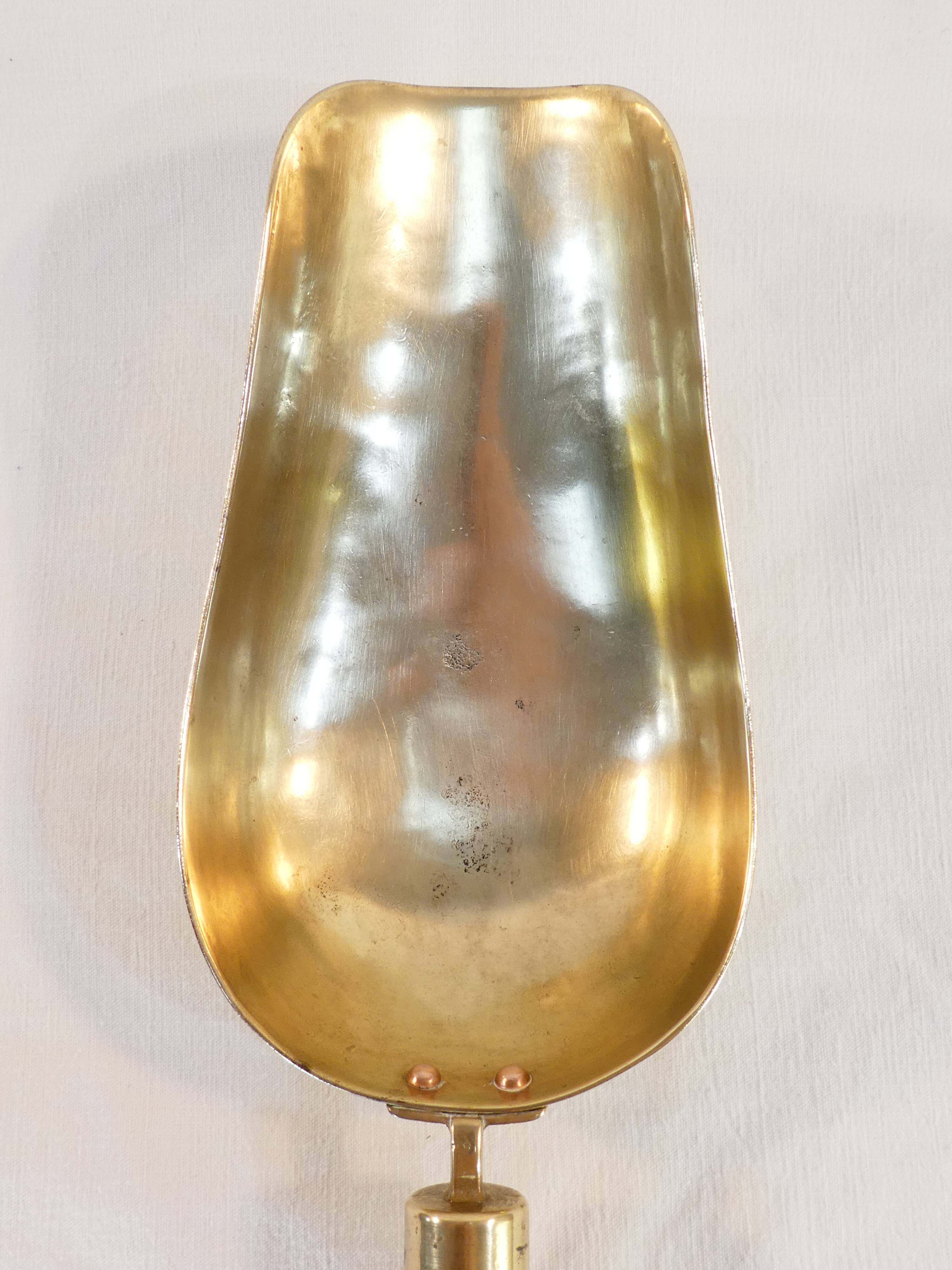 Old brass grocery grain shovel wooden handle