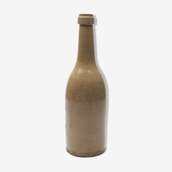 bottle in glazed and cracked sandstone