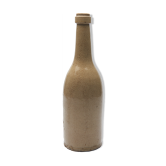 bottle in glazed and cracked sandstone