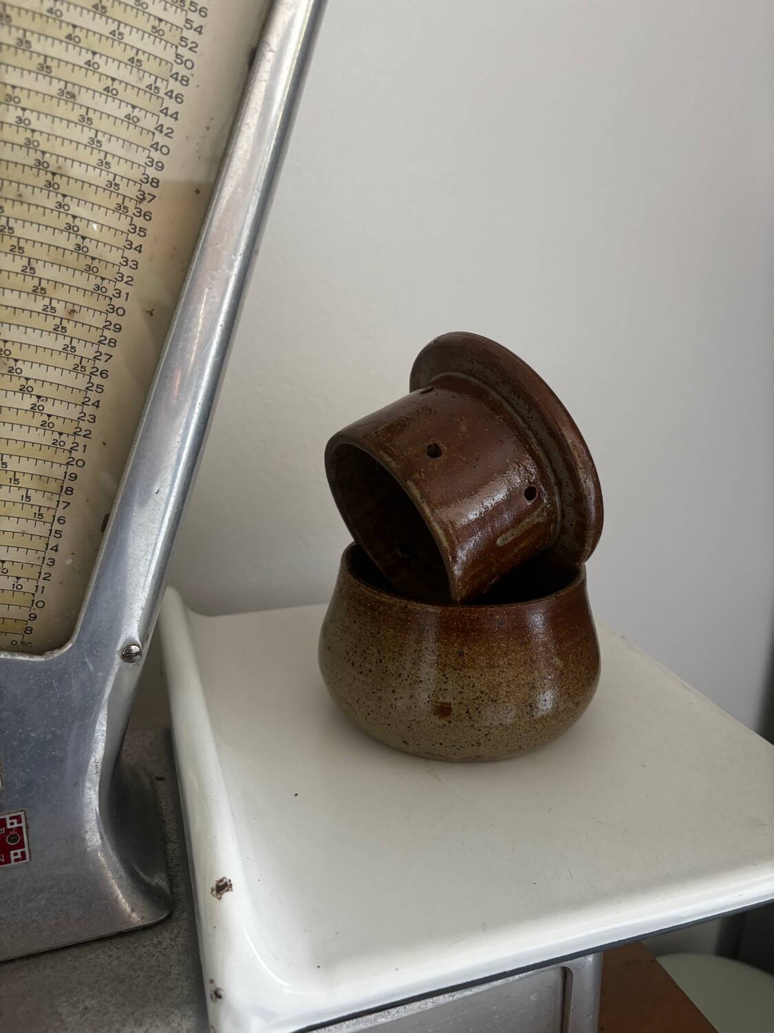 Glazed pottery water butter dish