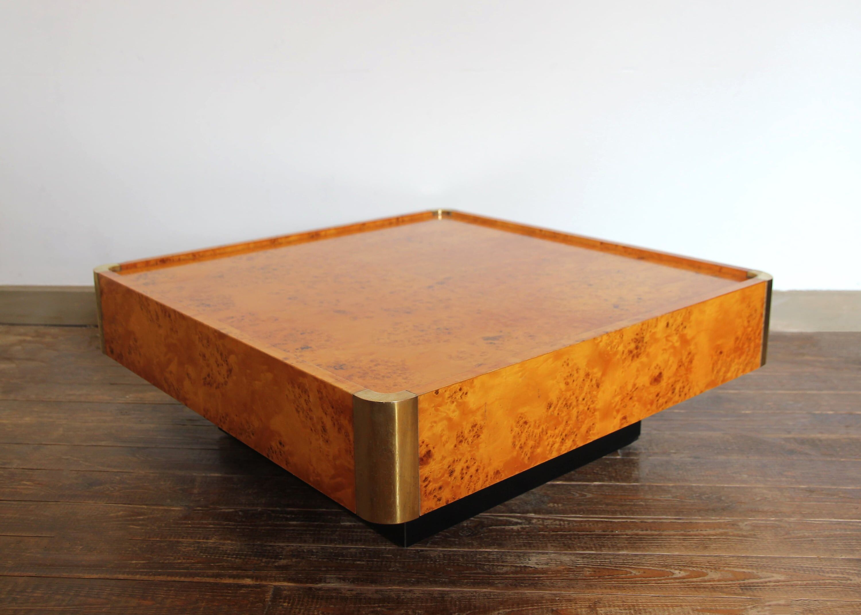 Table basse en loupe de bois pour Mario Sabot