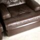 Pair of armchairs brown leather base stainless steel, France, circa 1970