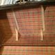 Suitcase vintage leather inside and brown carpeted home