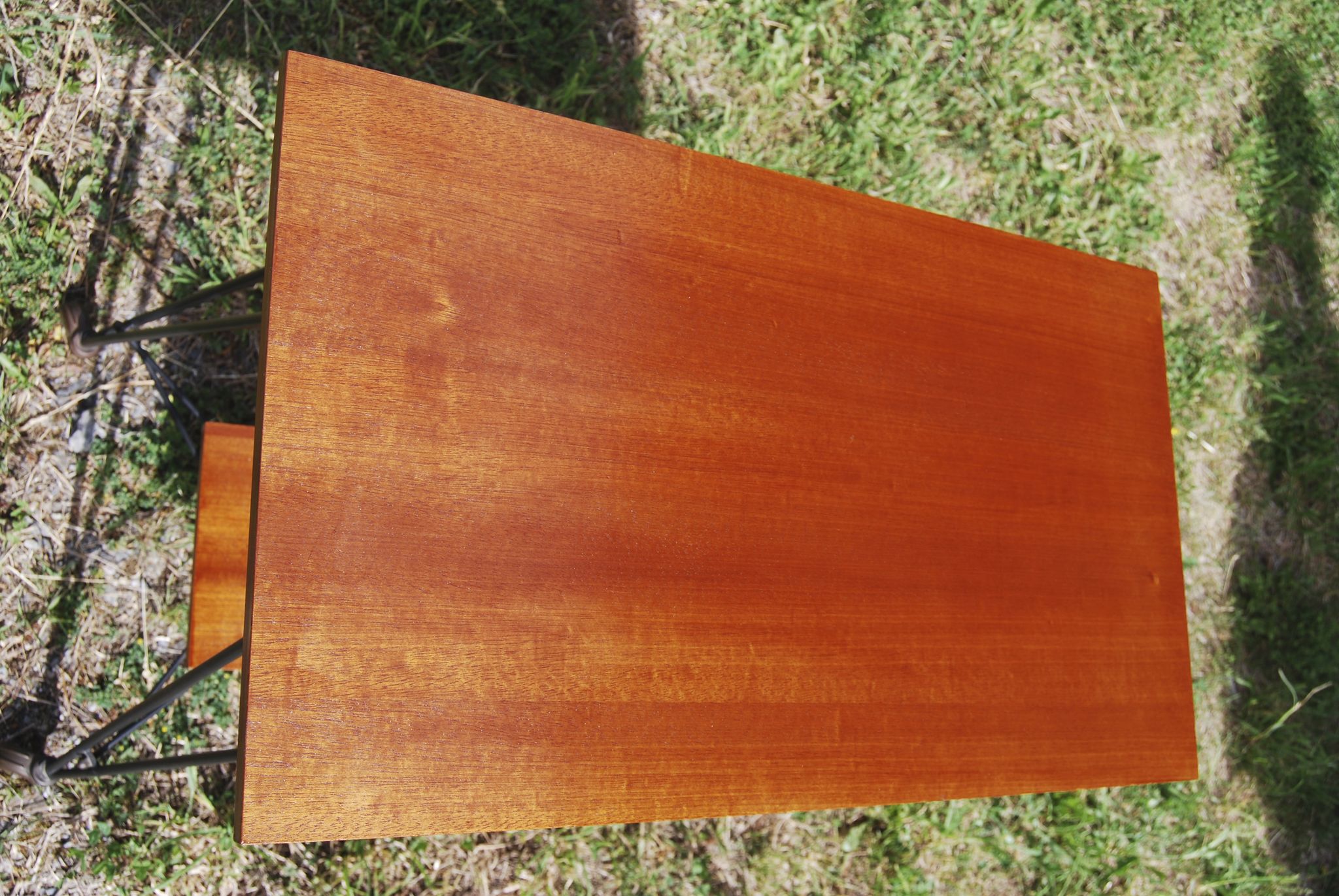 Tv furniture, a table with teak wheels and Scandinavian-style metal.