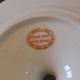 Set of 4 porcelain display cups of the depot rue Drouot in Paris