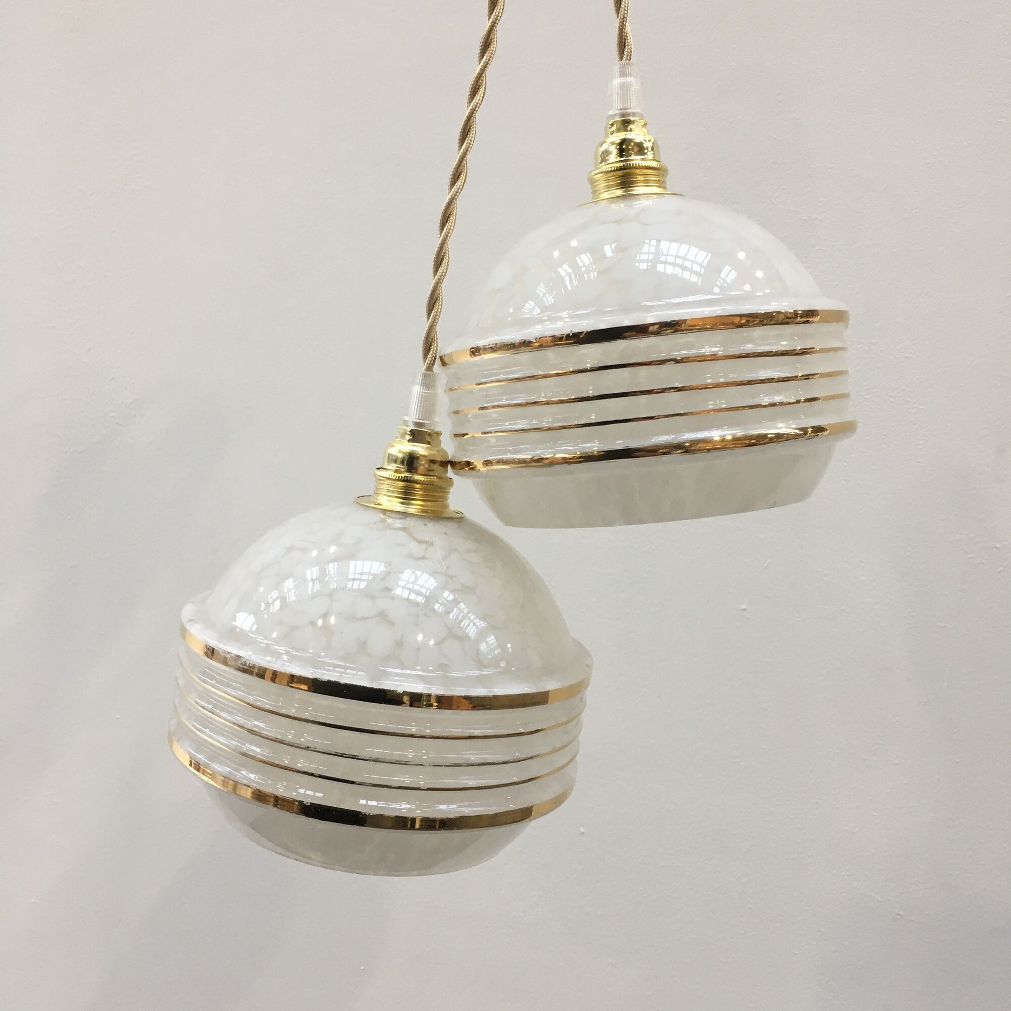 Pair of Art Deco ball suspensions in white Clichy glass