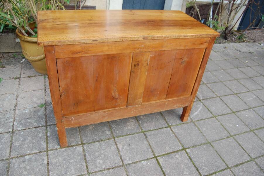 18th-century Louis XVI low walnut commode.
