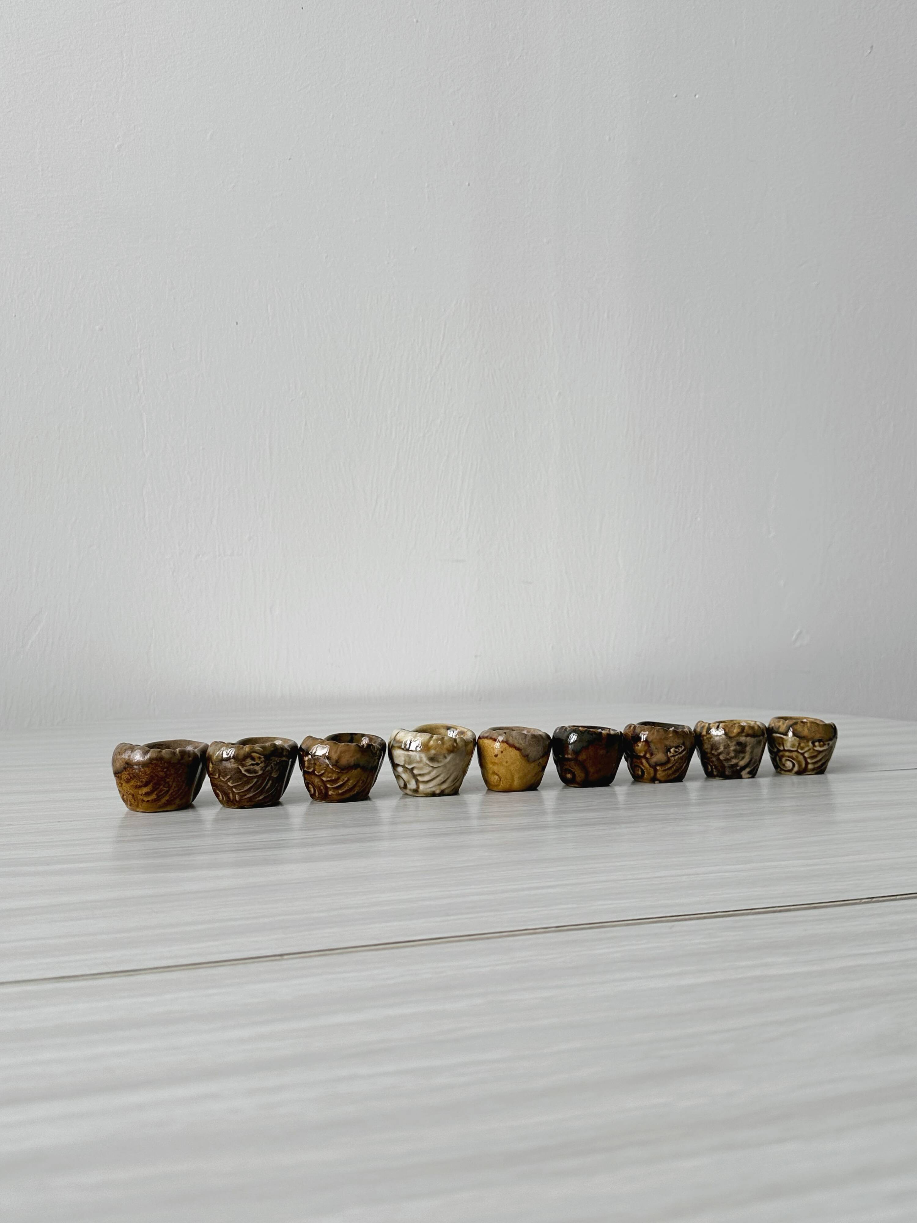 24 flambéed ceramic snail cups