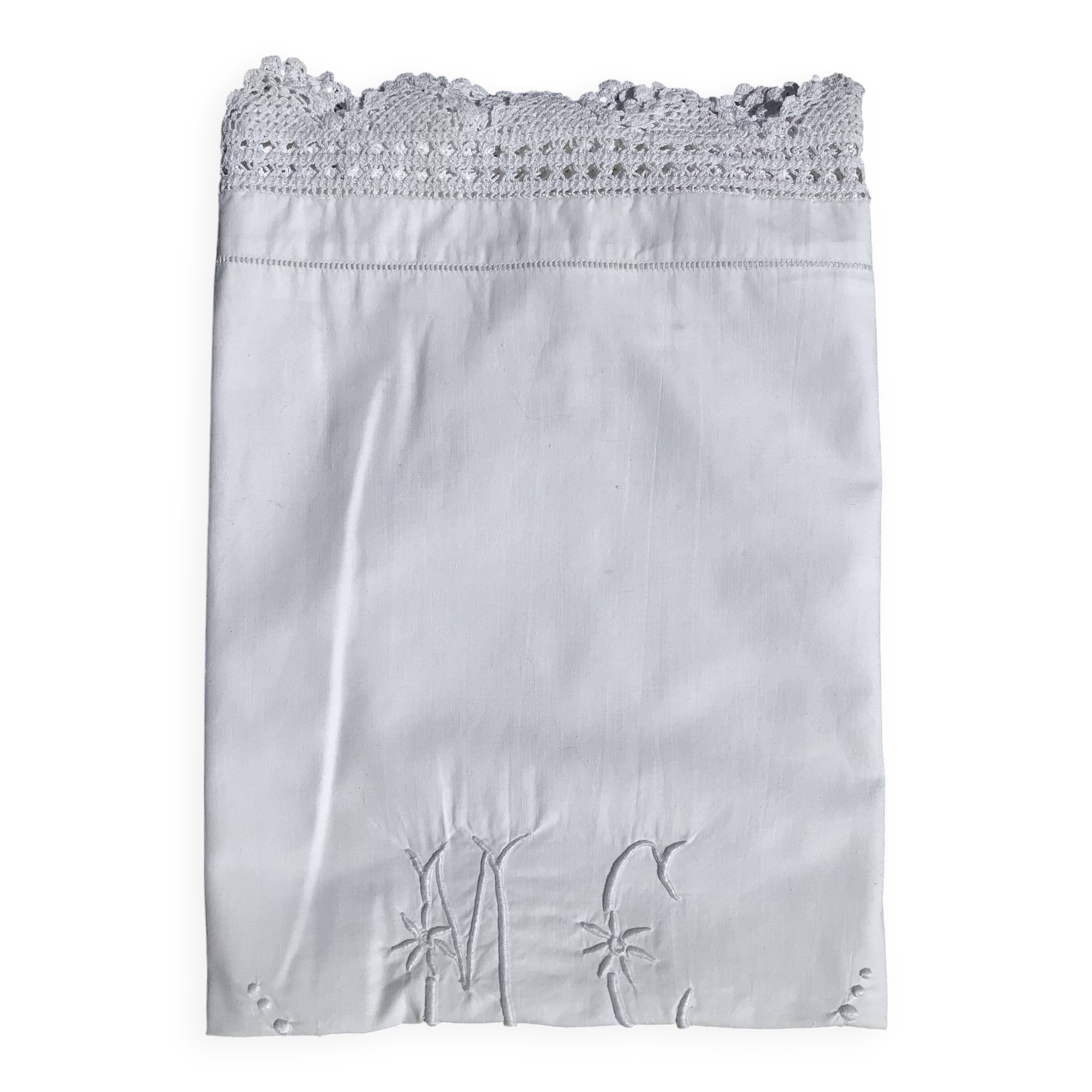MC embroidered pillowcase with flower detailing and crocheted edge