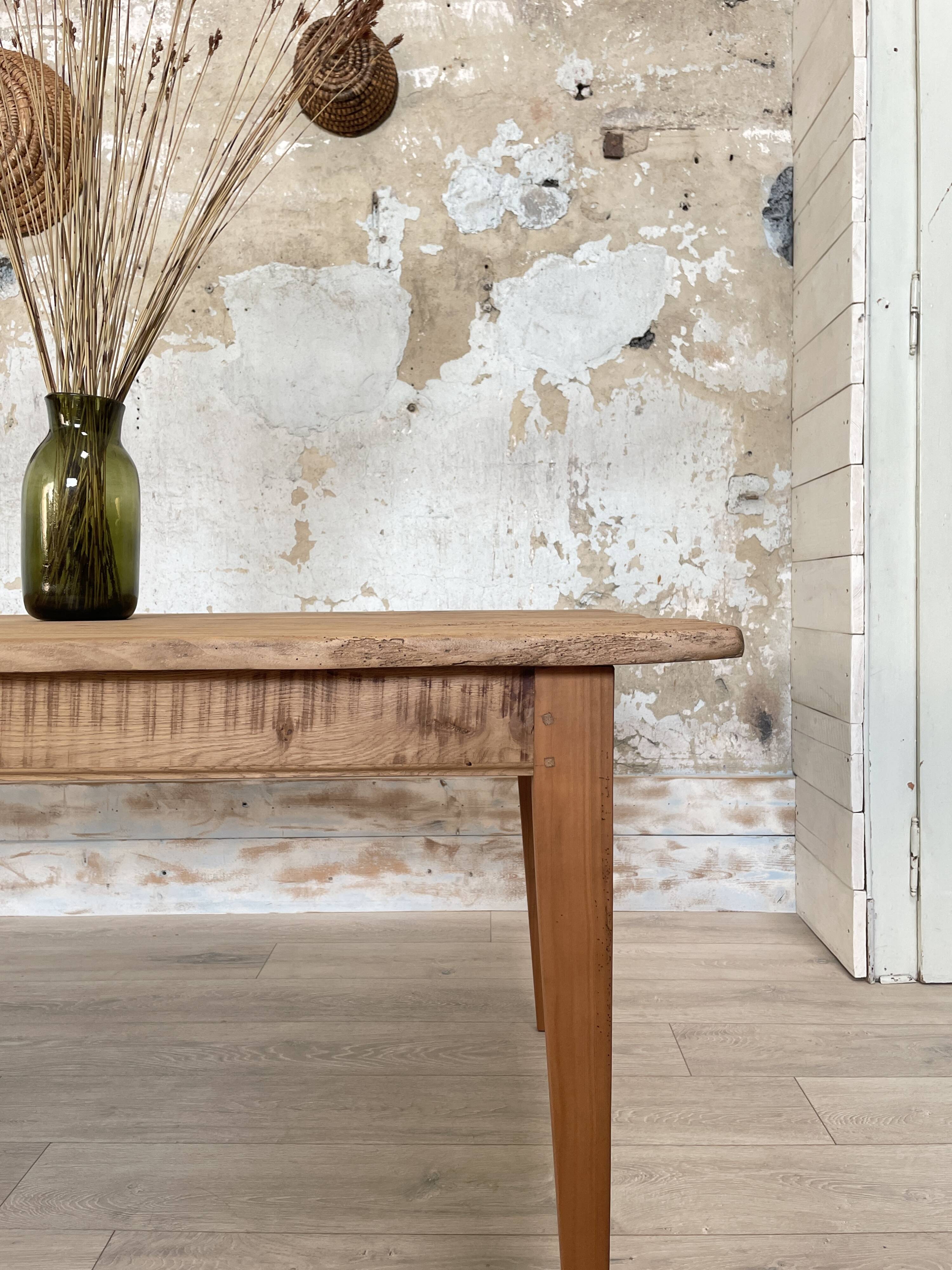 Vintage farm table with spindle legs.