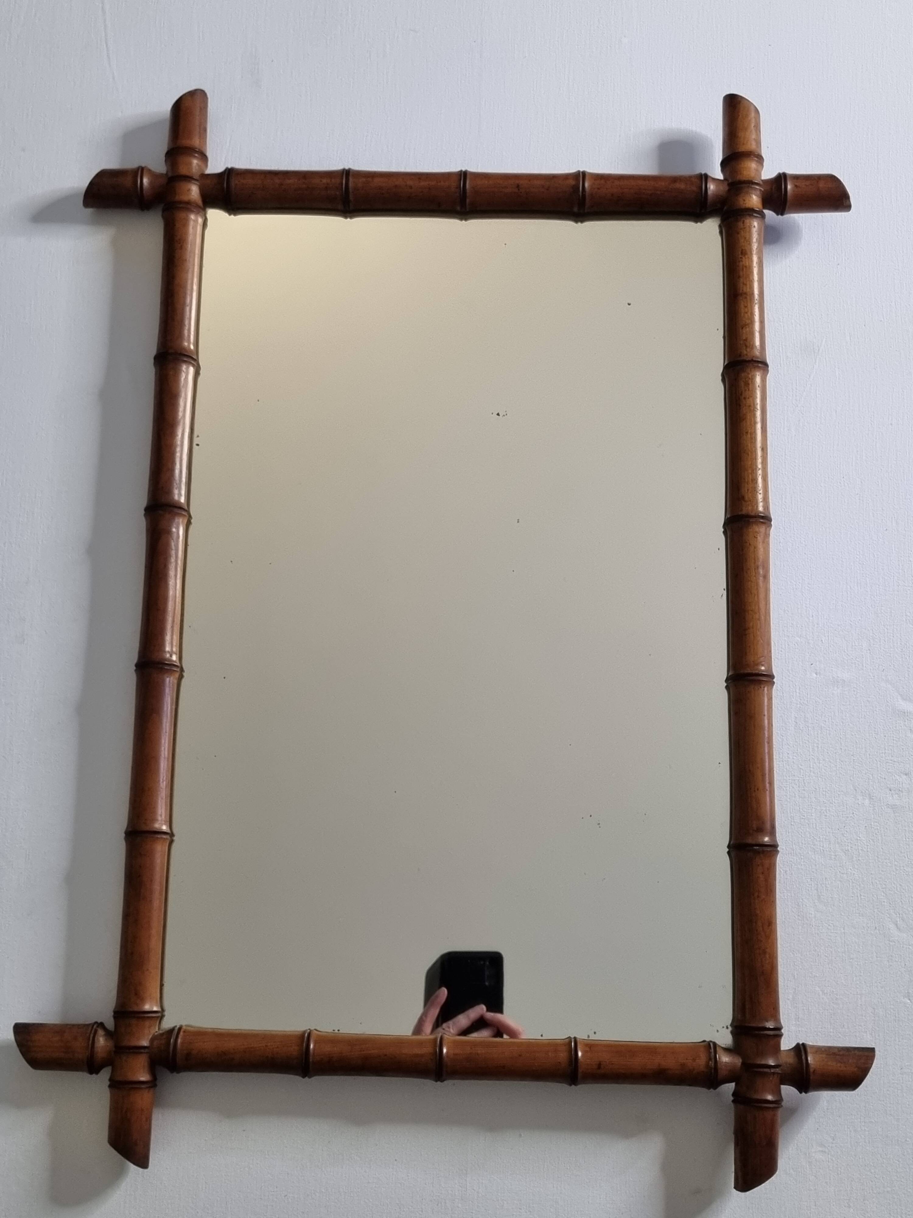 Large turned wooden bamboo mirror, 55 x 78 cm, circa 1900