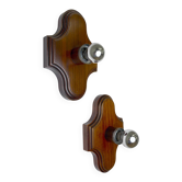 Pair of geometric Art Deco wall lights, carved brown wood, France, 1960s