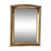 Art Deco mirror in gilded wood with curved floral decorations.