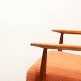 Scandinavian design curly orange armchair by H.Lis