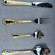 Varaguen 70-piece 23-carat gold-plated cutlery set