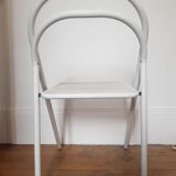 Vintage perforated metal folding chair