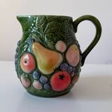 Carafe of water in slush with fruits