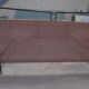 Black metal and rattan bed frame