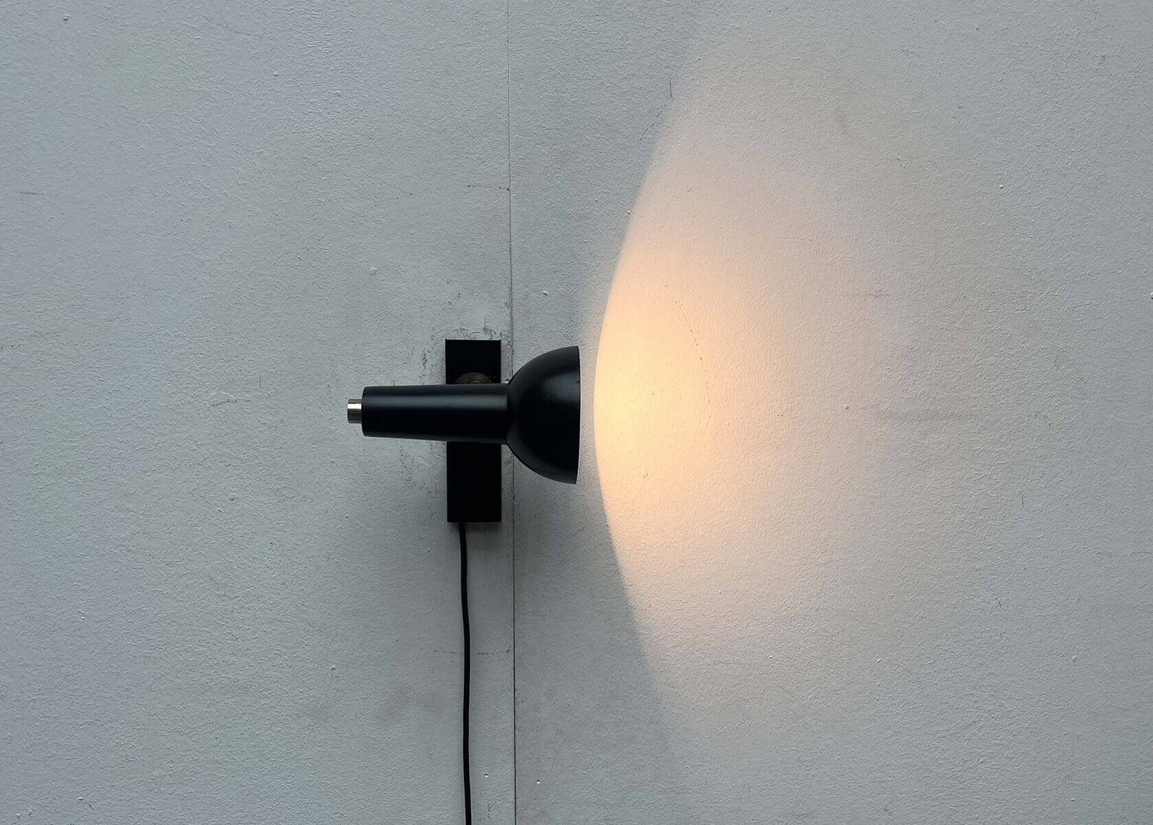 Mid-century German black minimalist wall lamp by Hustadt, 1960s.