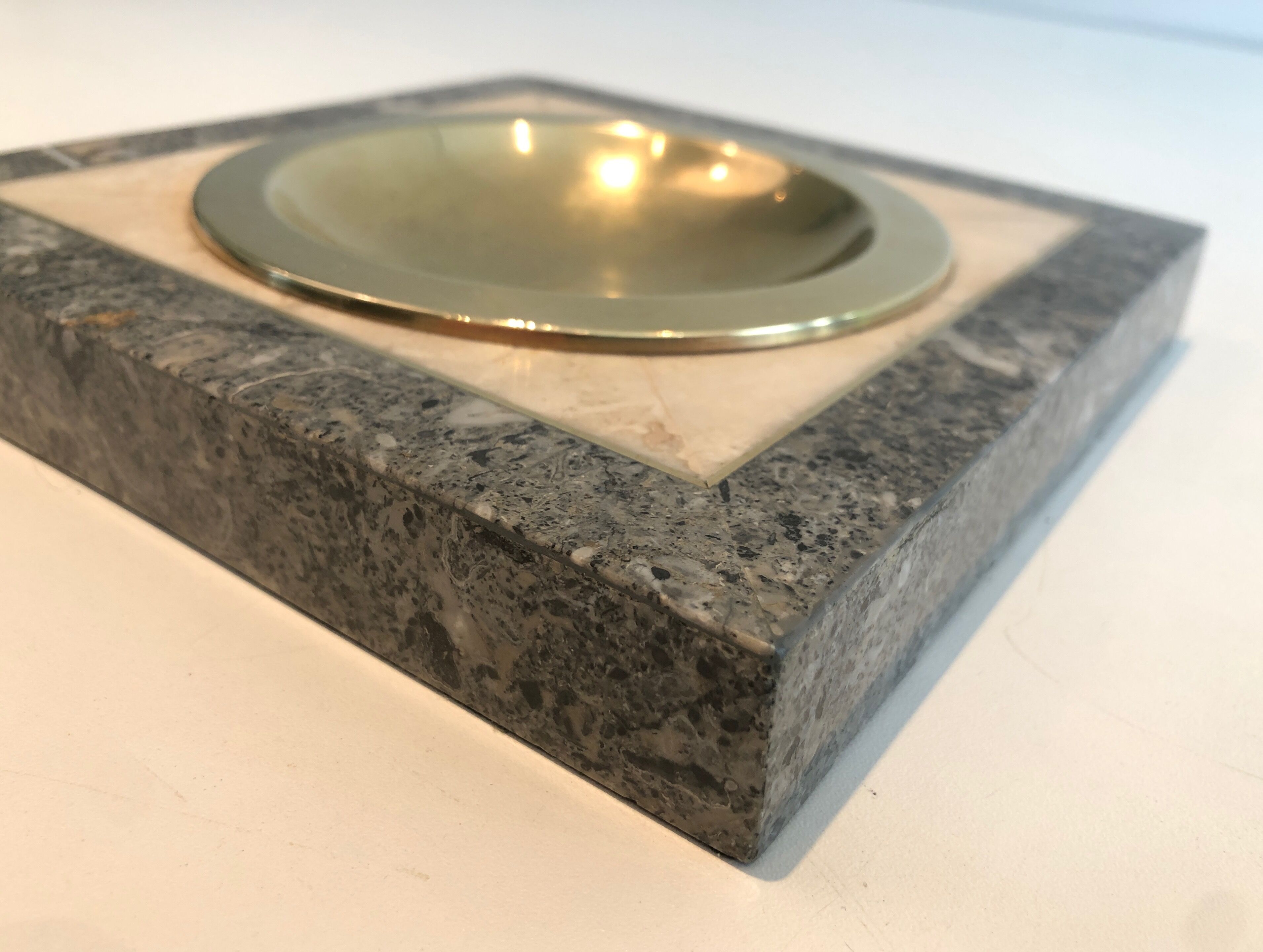 Neoclassical style pocket empty in faux-marble and brass. french work. around 1970