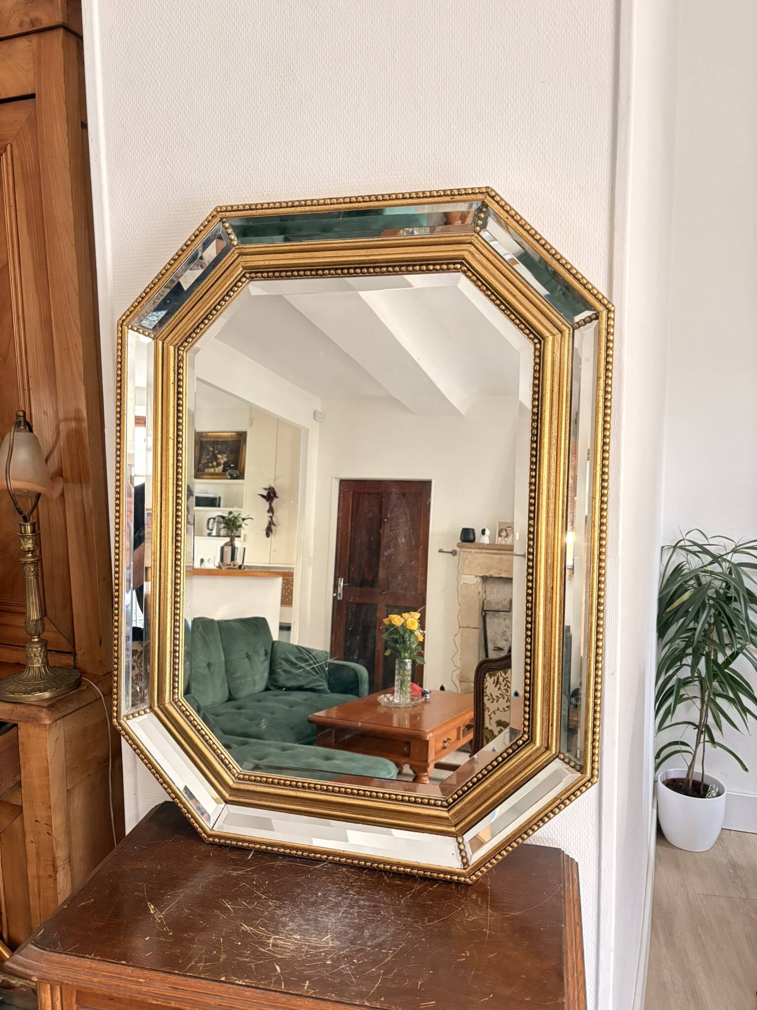 Octagonal mirror with bevelled parcloses, Neo-Classical Regency Art style.