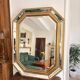 Octagonal mirror with bevelled parcloses, Neo-Classical Regency Art style.