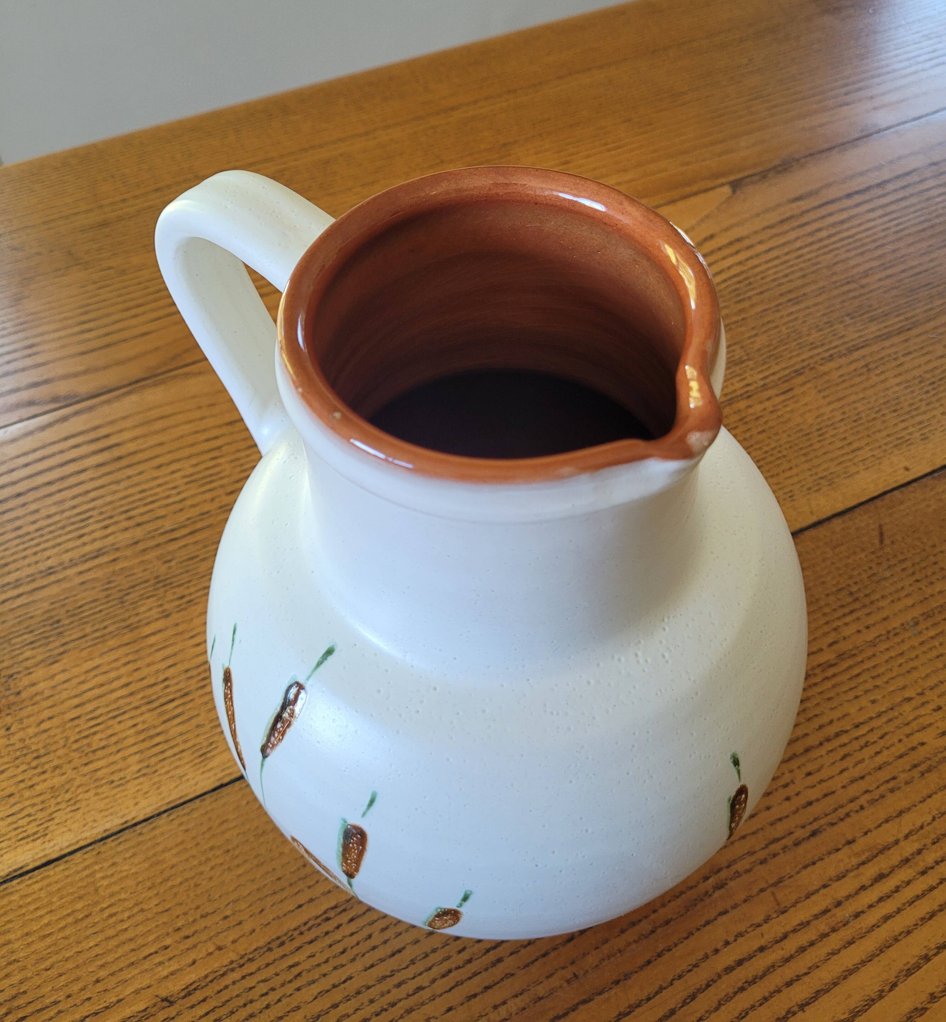 XL ceramic pitcher signed