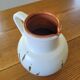 XL ceramic pitcher signed