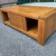 Solid wood coffee table with sliding door, stained pine, 120x60cm.
