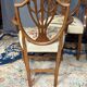 Set of four Sheraton-style armchairs. Solid walnut.