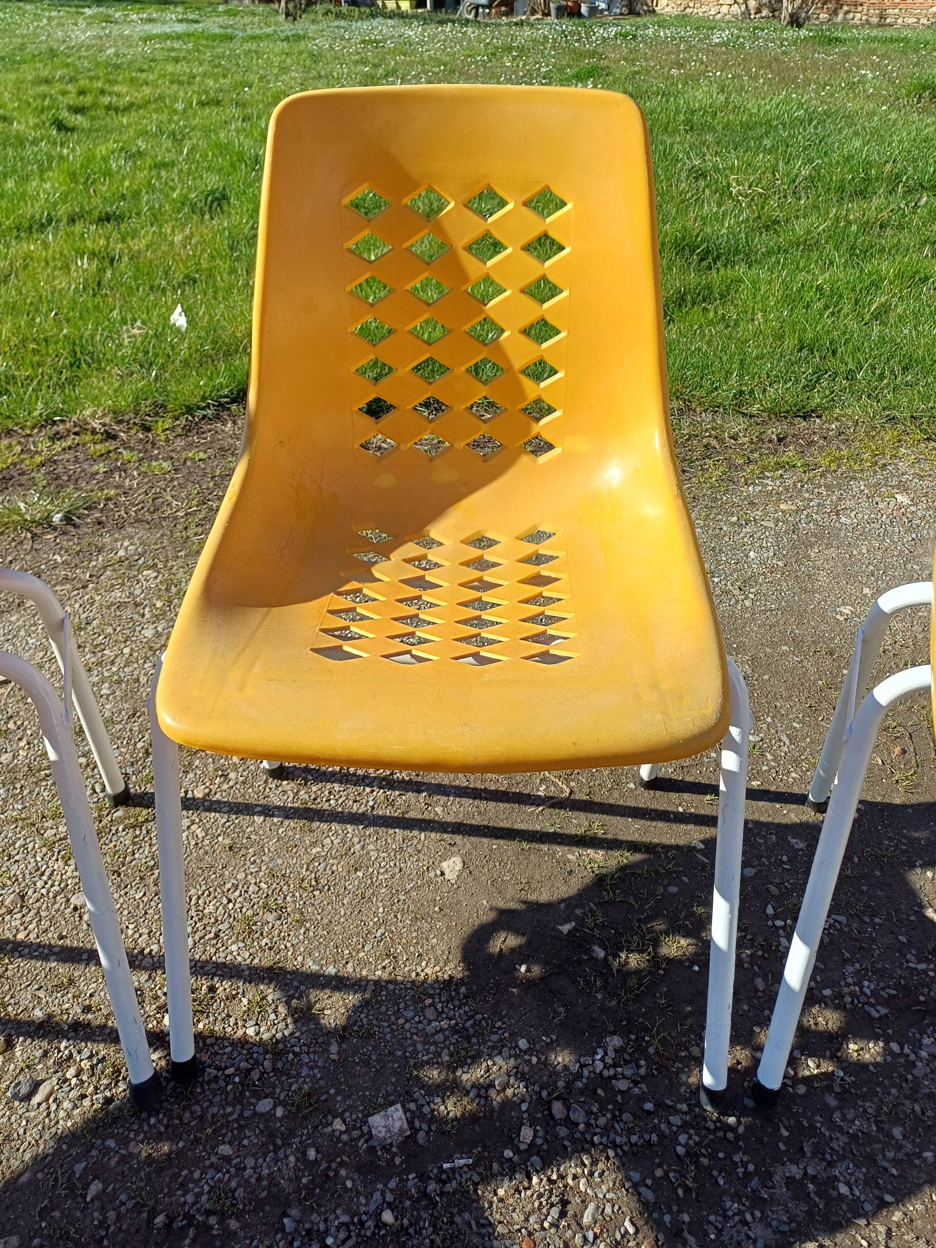 6 vintage iron and orange plastic garden chairs